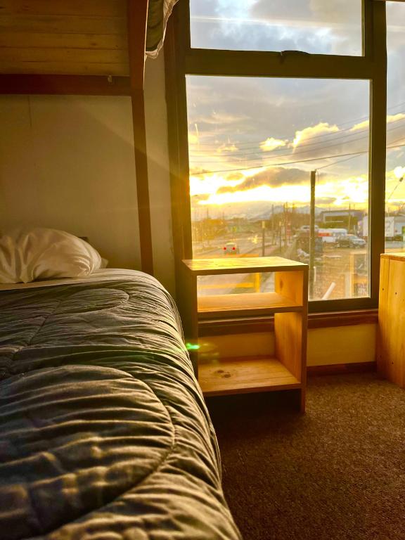 Postel nebo postele na pokoji v ubytování Hostel Rosa de los Vientos