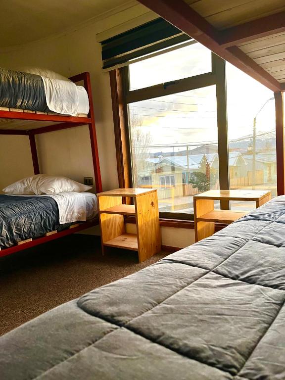 Postel nebo postele na pokoji v ubytování Hostel Rosa de los Vientos