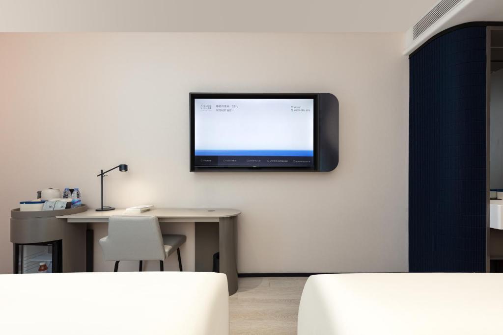TV o dispositivi per l'intrattenimento presso Atour Light Hotel Wuxi Taihu Lake Expo Center Financial Street