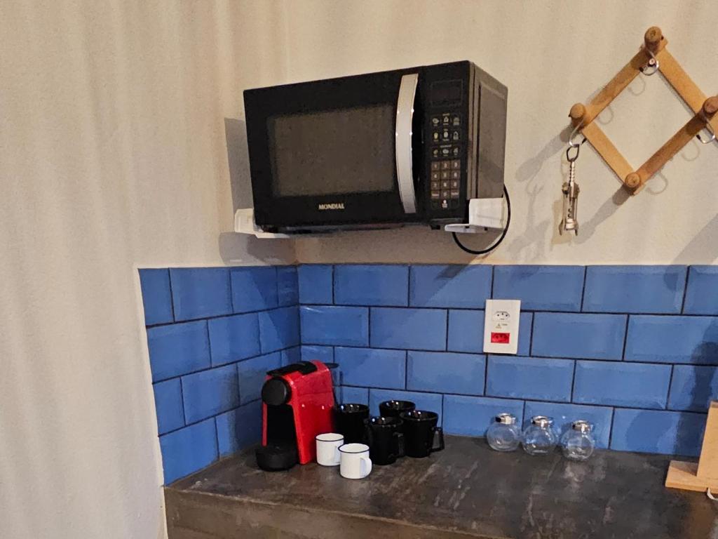 Příslušenství pro přípravu čaje a kávy v ubytování Tapioca Vila Boutique