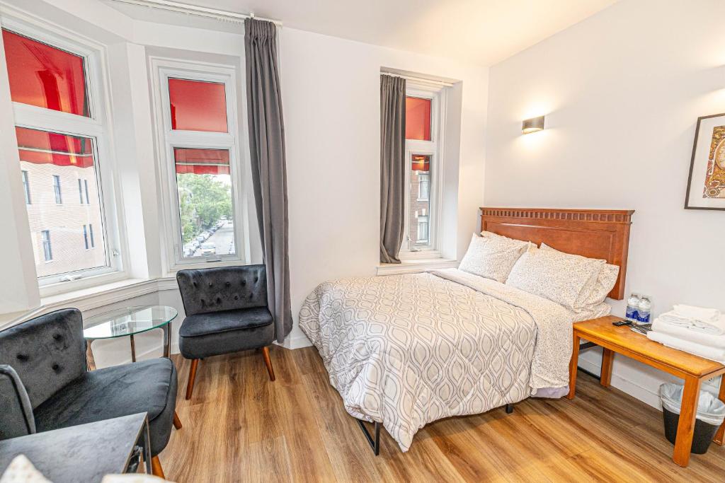 Postel nebo postele na pokoji v ubytování hotel le coach