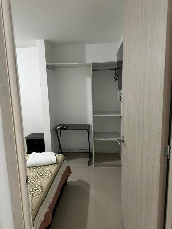 Postel nebo postele na pokoji v ubytování HOTEL IBIZA