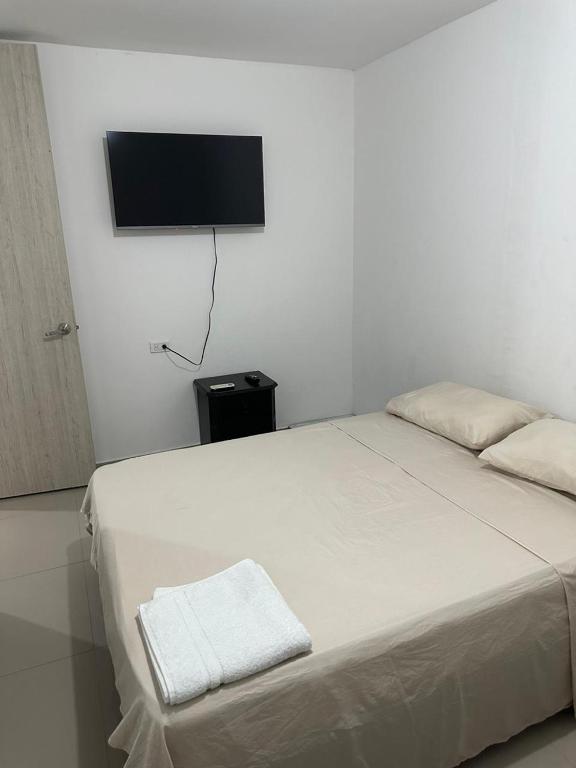 Postel nebo postele na pokoji v ubytování HOTEL IBIZA