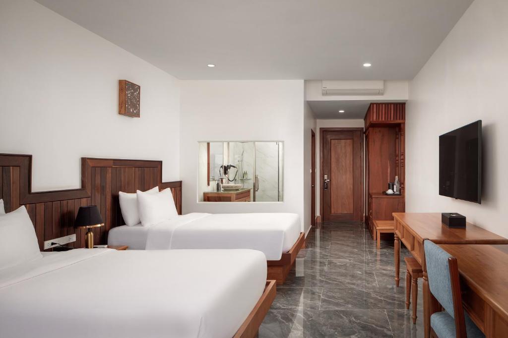 TV a/nebo společenská místnost v ubytování Two Seasons Siem Reap Hotel