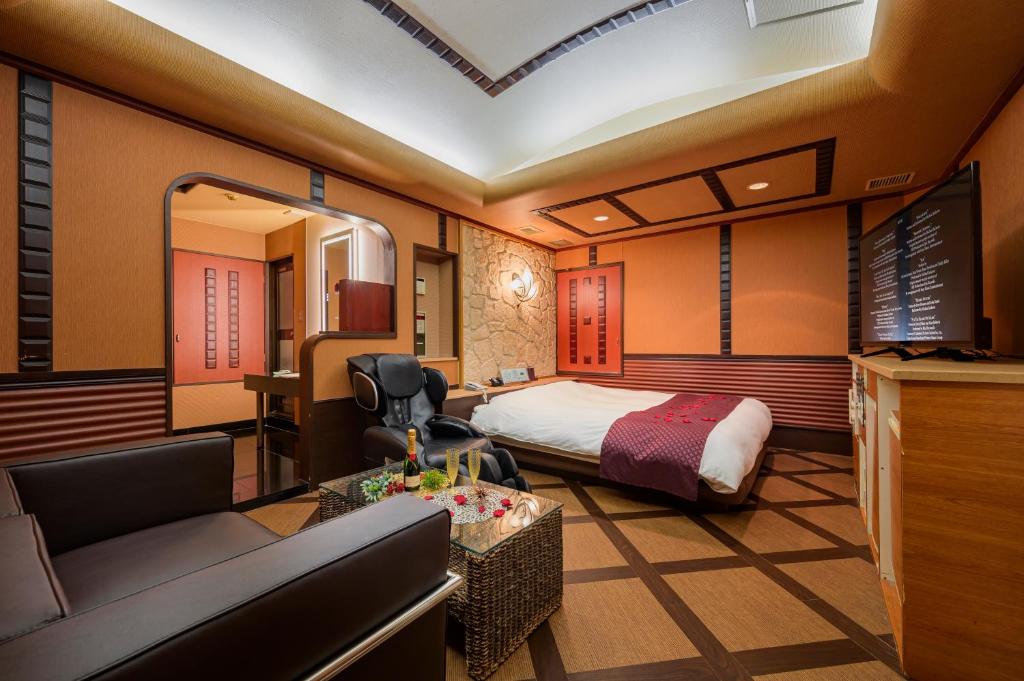 Postel nebo postele na pokoji v ubytování HOTEL MOBILIA (Adult Only)