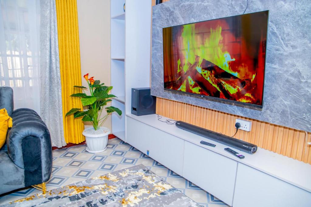 TV a/nebo společenská místnost v ubytování Greenstar cozy home