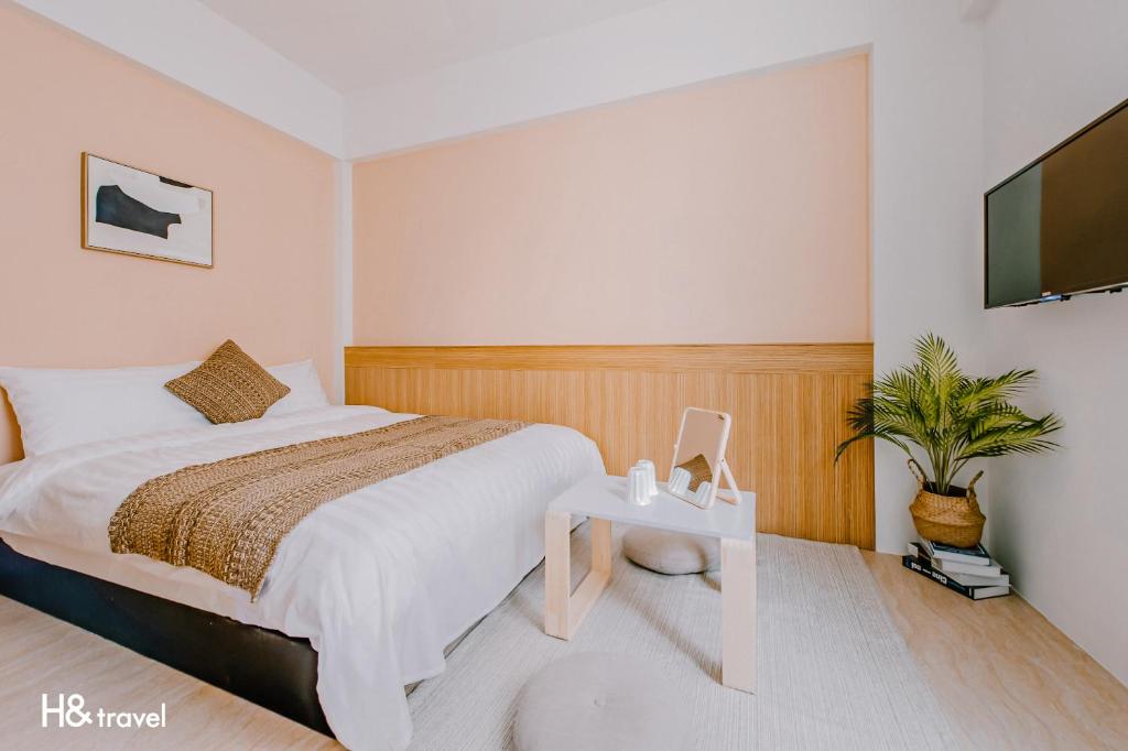 Postel nebo postele na pokoji v ubytování Apple Scent Stay