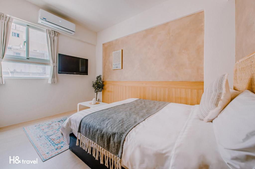 Postel nebo postele na pokoji v ubytování Apple Scent Stay
