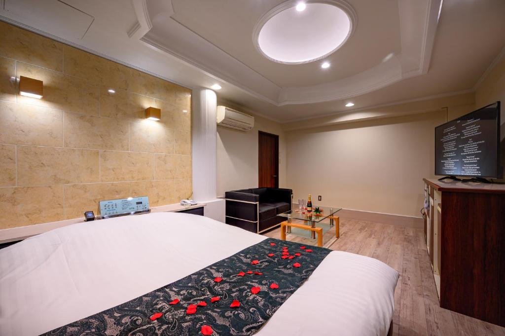 Postel nebo postele na pokoji v ubytování HOTEL MOBILIA (Adult Only)