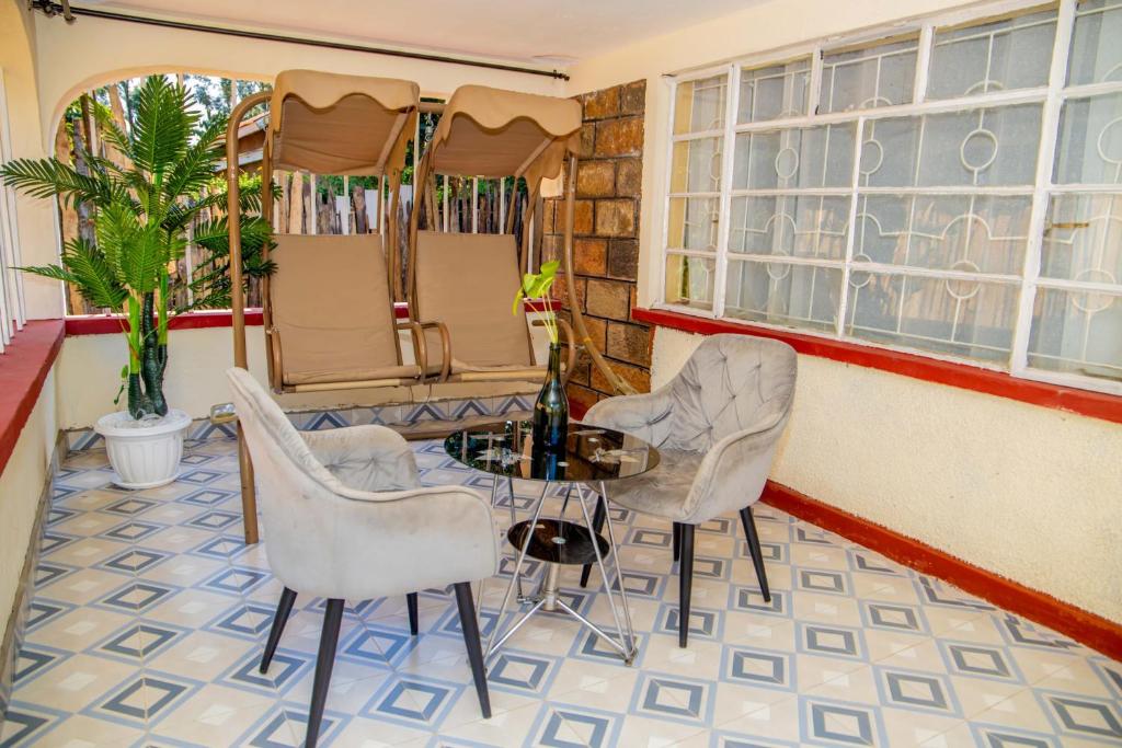 Posezení v ubytování Paradise cozy homes