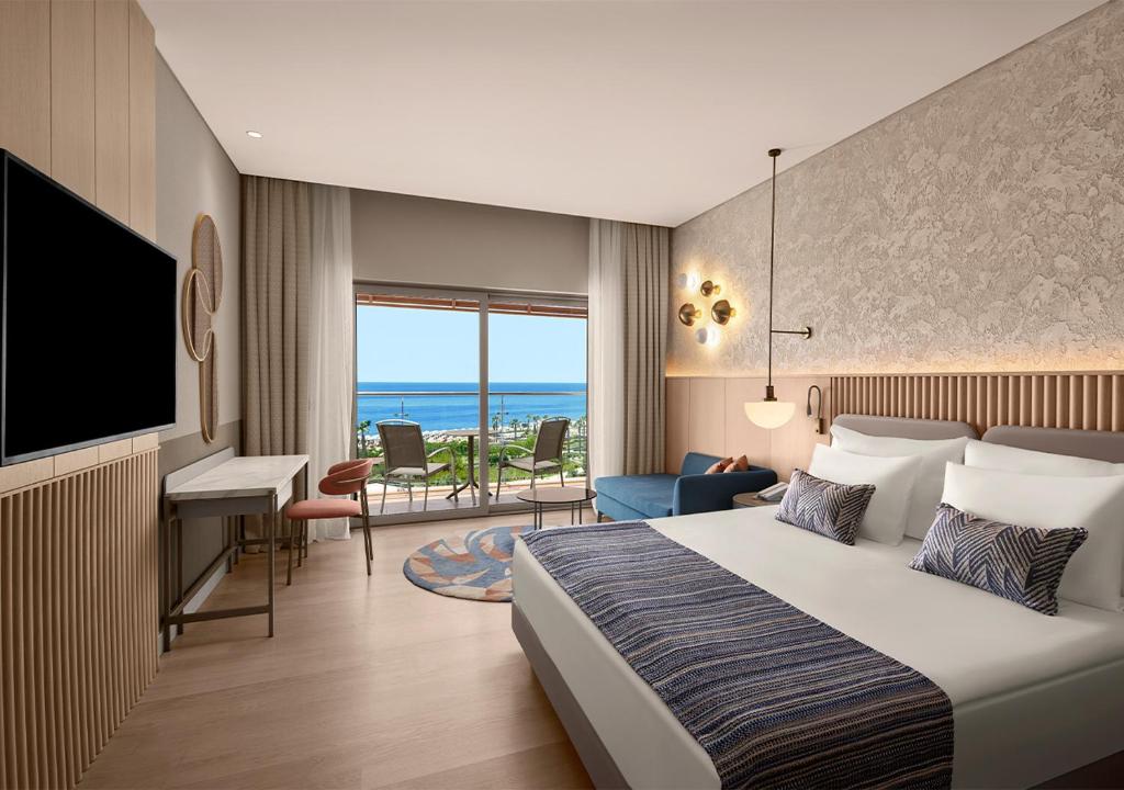 Postel nebo postele na pokoji v ubytování Akra Sorgun Tui Blue Sensatori - Ultra All Inclusive