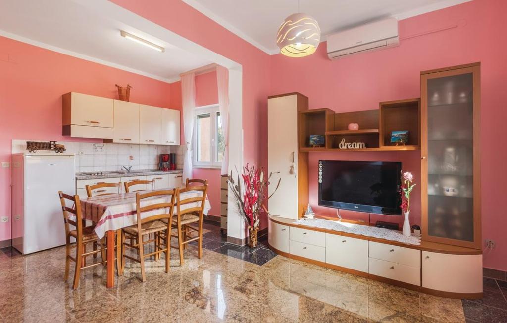 Kuchyň nebo kuchyňský kout v ubytování Apartments Armin