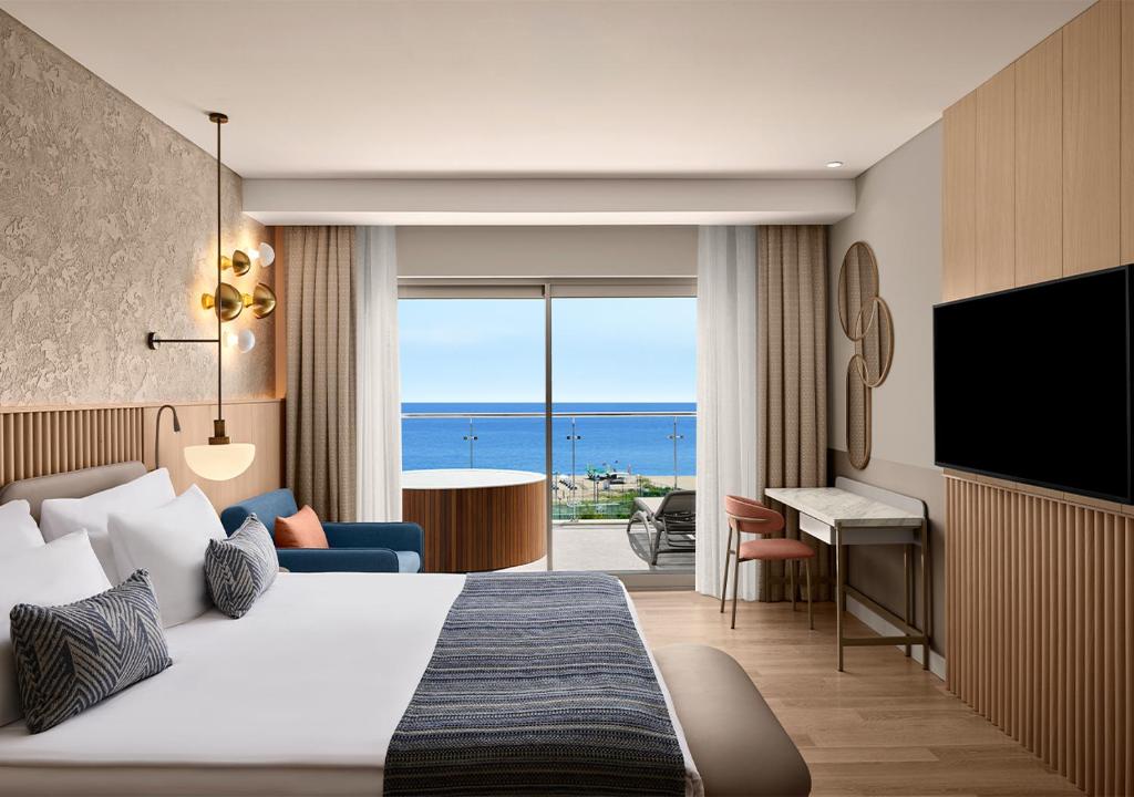 Postel nebo postele na pokoji v ubytování Akra Sorgun Tui Blue Sensatori - Ultra All Inclusive