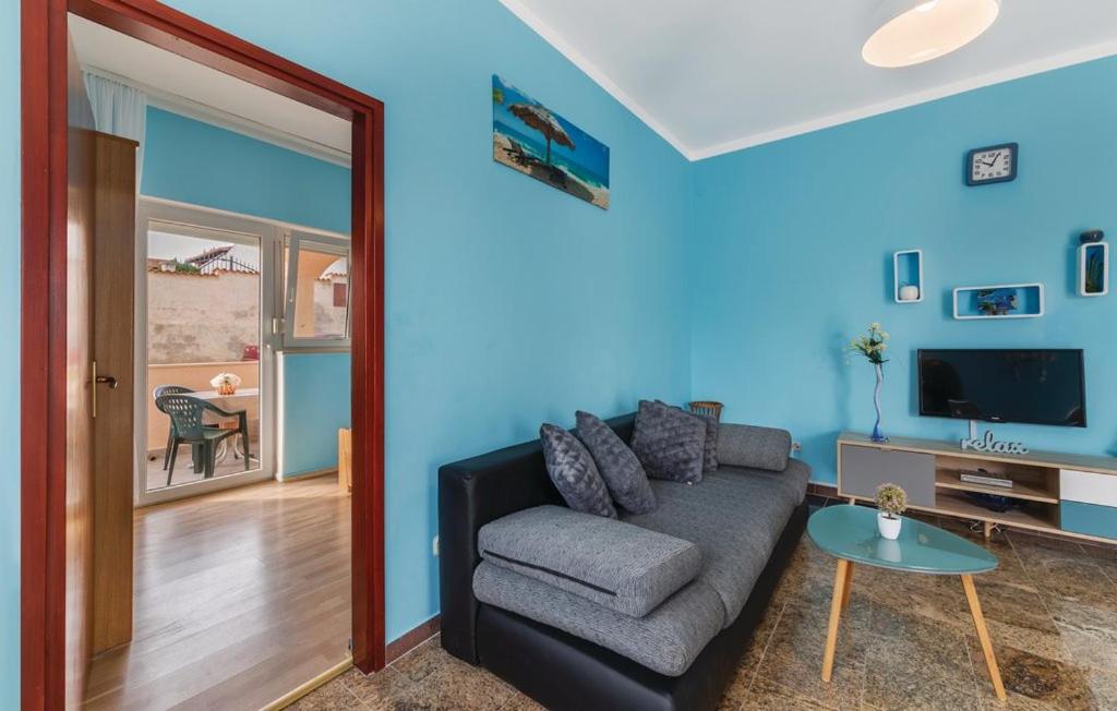 TV a/nebo společenská místnost v ubytování Apartments Armin