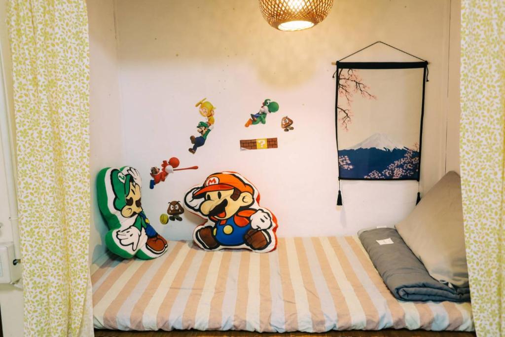 Postel nebo postele na pokoji v ubytování Huangpu Hostel