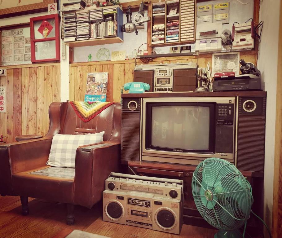 TV a/nebo společenská místnost v ubytování Huangpu Hostel