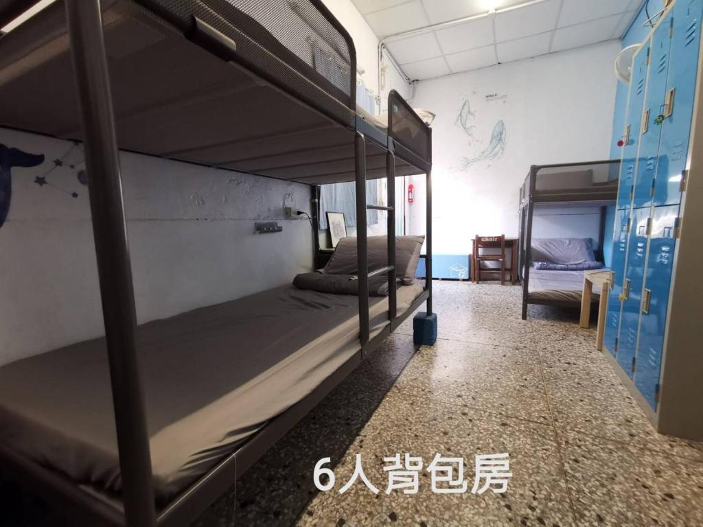 Postel nebo postele na pokoji v ubytování Huangpu Hostel