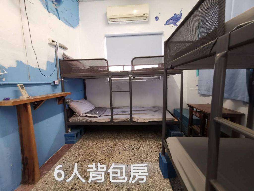 Postel nebo postele na pokoji v ubytování Huangpu Hostel