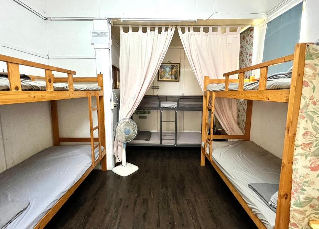 Postel nebo postele na pokoji v ubytování Huangpu Hostel