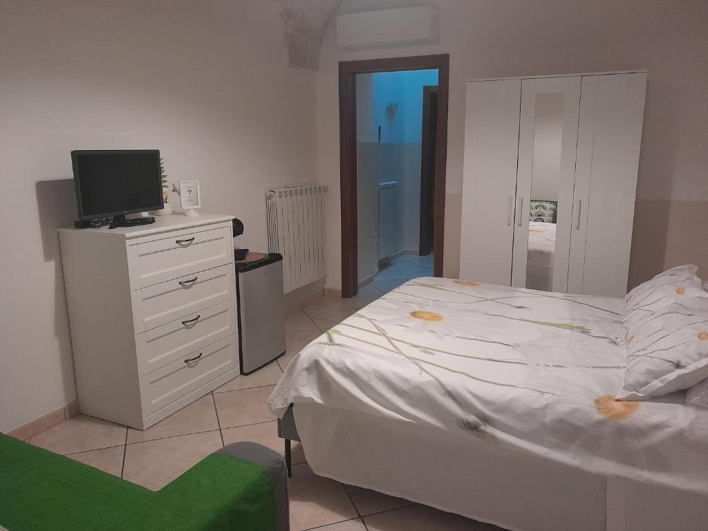 Postel nebo postele na pokoji v ubytování B&B Margherita