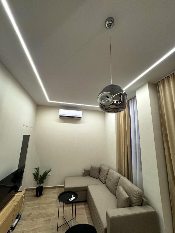 O zonă de relaxare la Nomad Stay Apartments