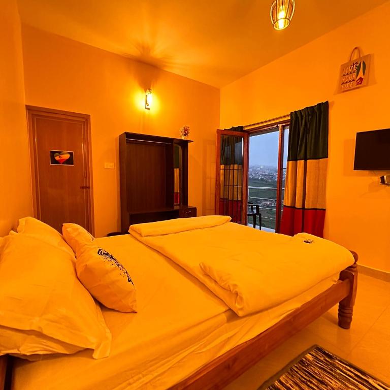 Postel nebo postele na pokoji v ubytování Rastafari - The Backpackers Hostel