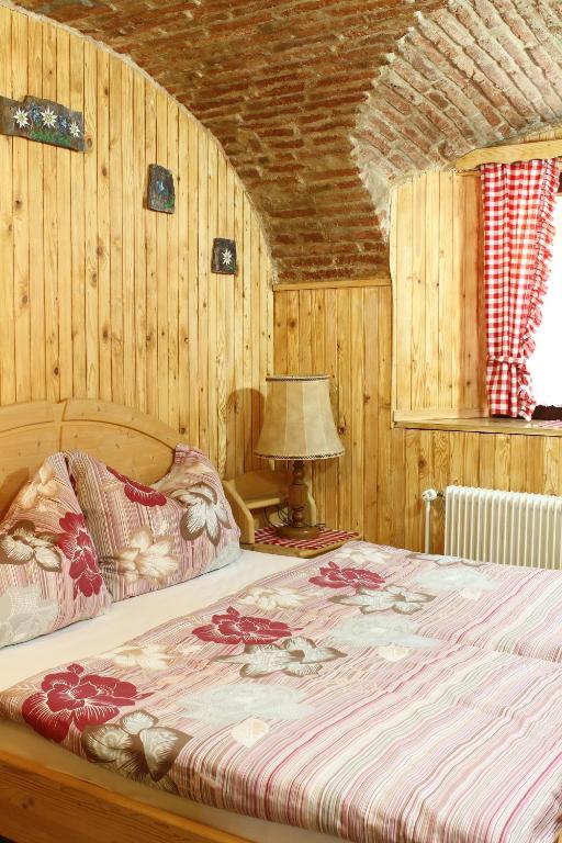 Postel nebo postele na pokoji v ubytování Slovenian Traditional Guest House