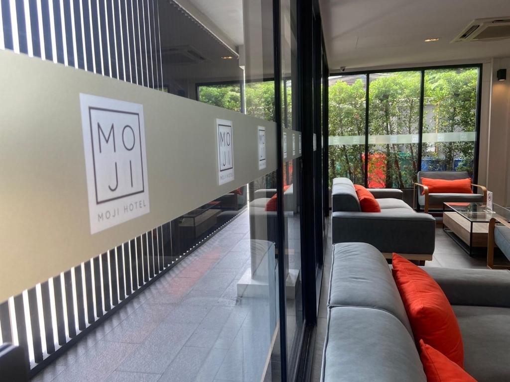 A bright lounge beside the hotel’s glass-fronted entrance.