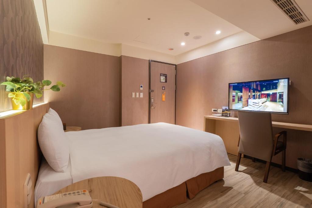 TV a/nebo společenská místnost v ubytování Guide Hotel Taipei Fuxing North