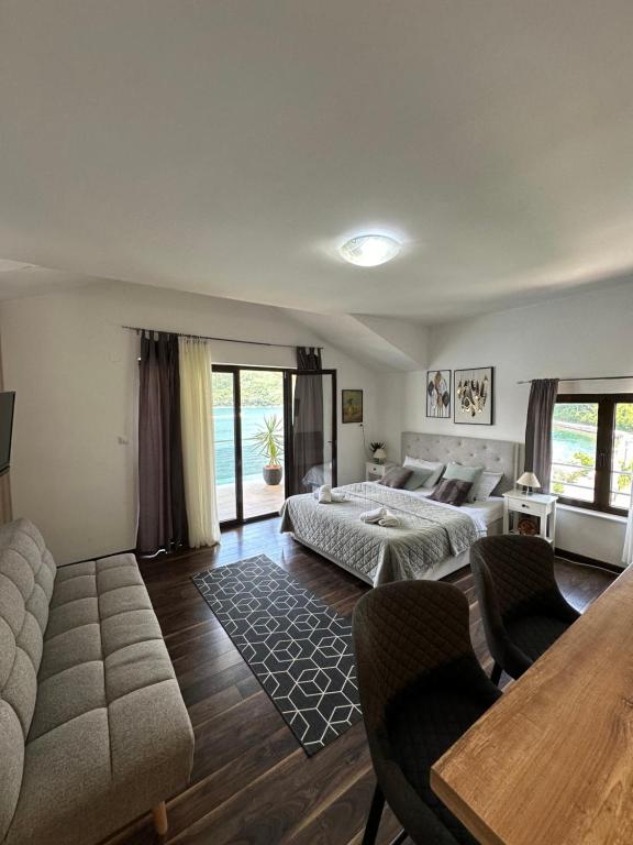 Postel nebo postele na pokoji v ubytování Apartments MaXhit