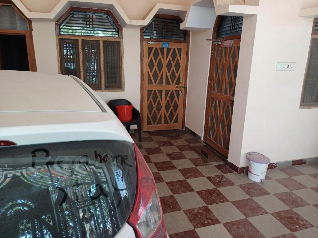 Postel nebo postele na pokoji v ubytování Vaidehi Vihar Kunj, Home Stay