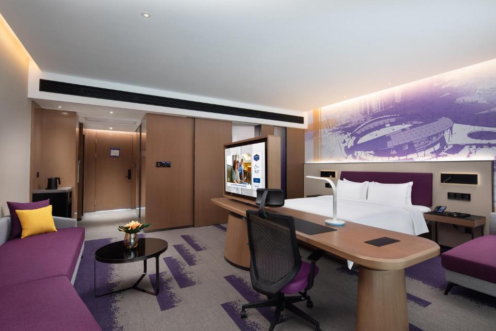 TV a/nebo společenská místnost v ubytování Hampton by Hilton Guigang