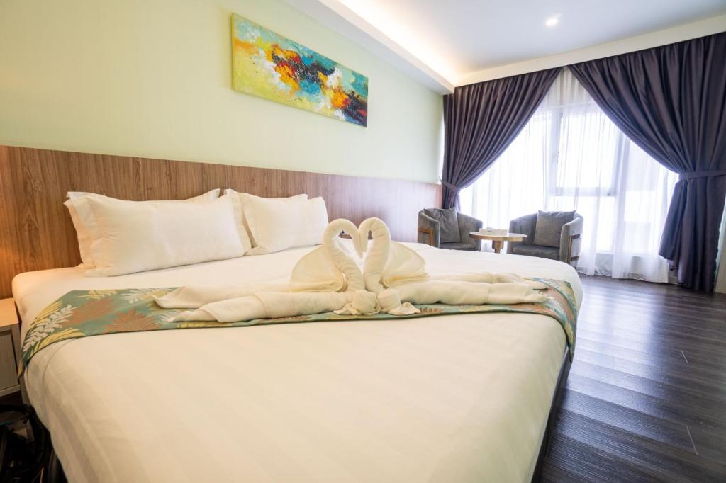 Postel nebo postele na pokoji v ubytování FLYPOD Hotel