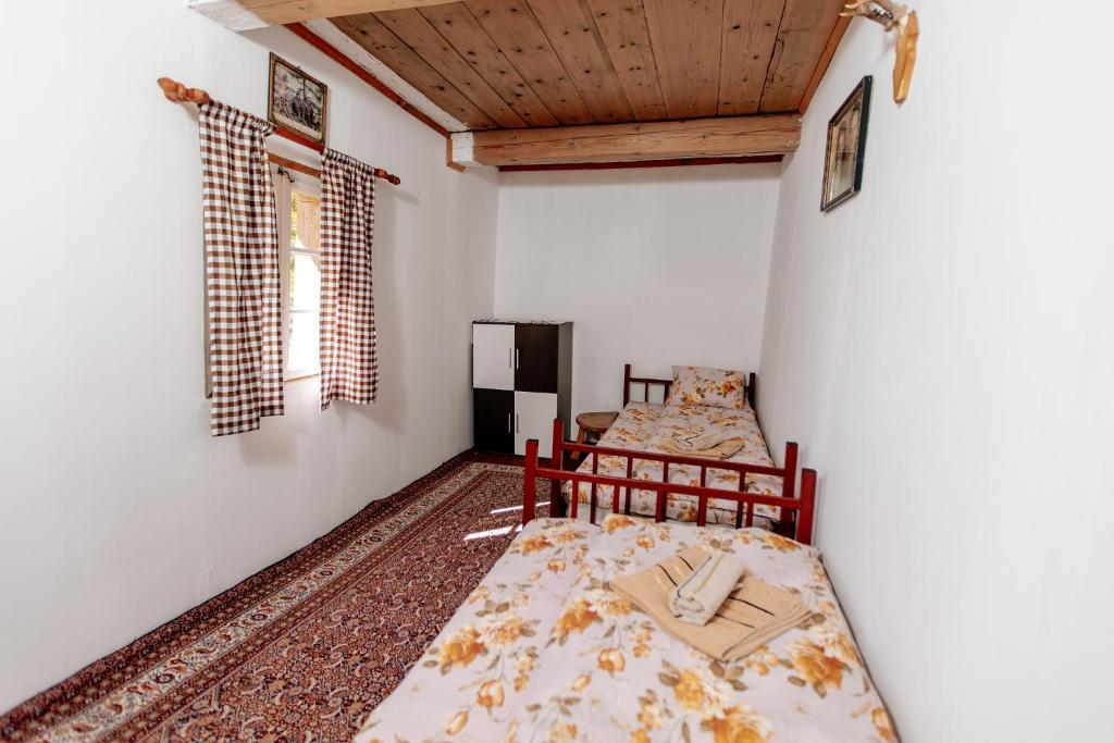 Postel nebo postele na pokoji v ubytování Household Ušćumlić - Oaza mira