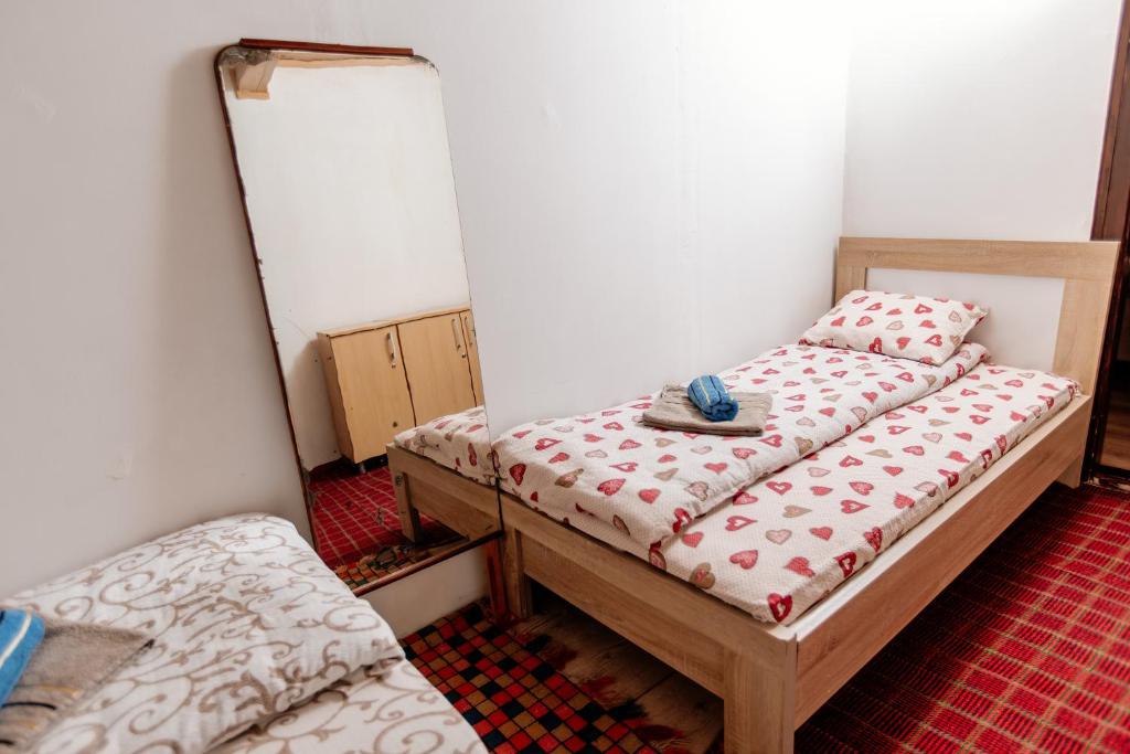 Postel nebo postele na pokoji v ubytování Household Ušćumlić - Oaza mira