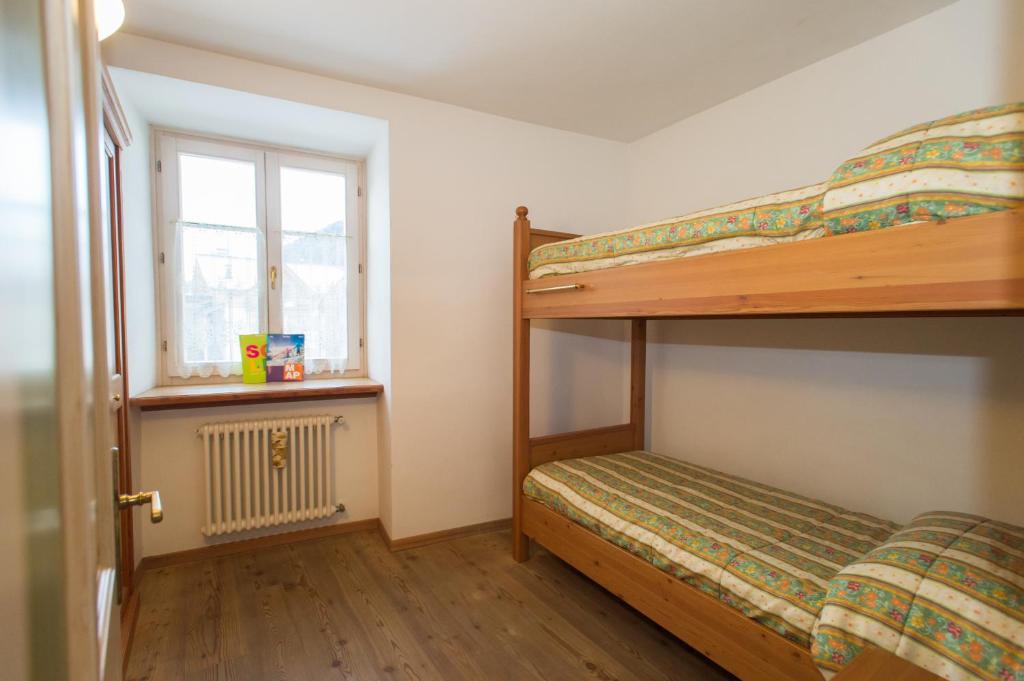 Postel nebo postele na pokoji v ubytování Casa Tomaselli