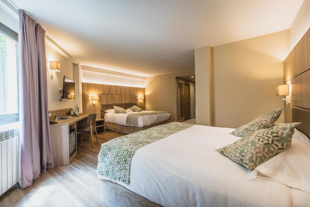 Postel nebo postele na pokoji v ubytování Hotel Princesa Parc