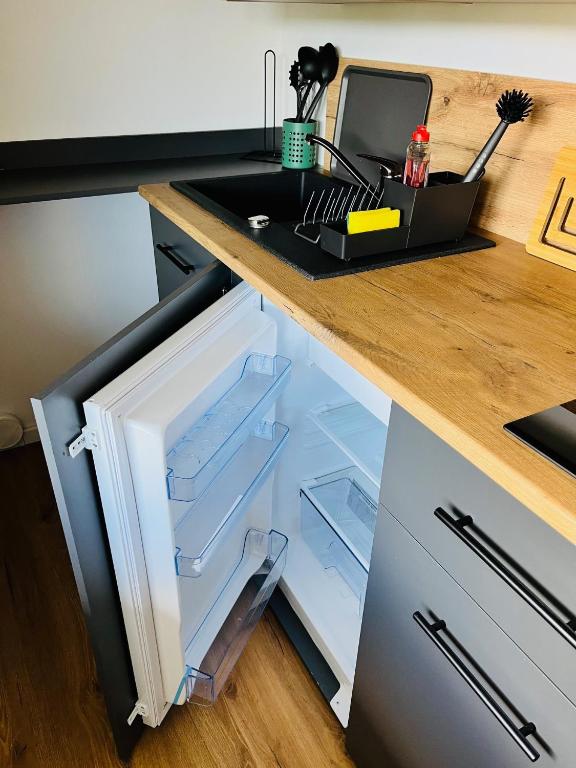 Kuchyň nebo kuchyňský kout v ubytování Haus am Jungbrunnen Apartment 1