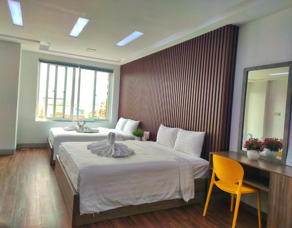 Postel nebo postele na pokoji v ubytování Panda Hostel