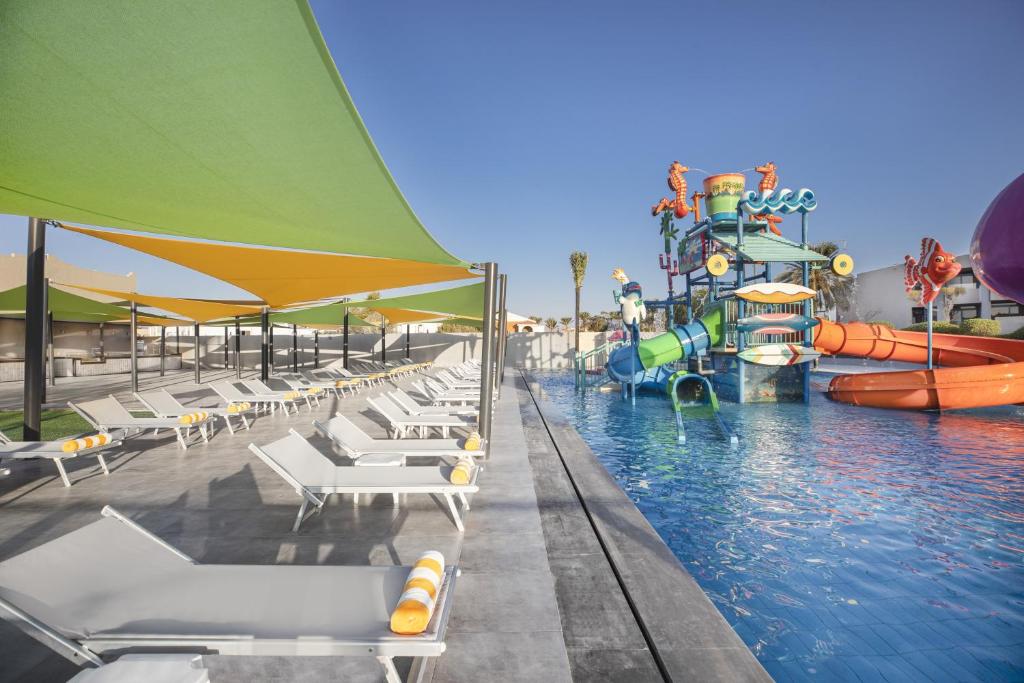 a pool with a water park with a water slide at V Hotel Sharm El Shiekh in Sharm El Sheikh