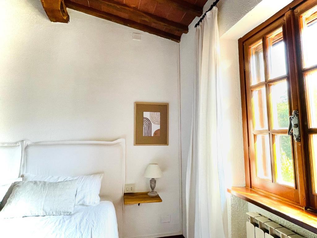 Postel nebo postele na pokoji v ubytování La Melea - vegan Bed and Breakfast