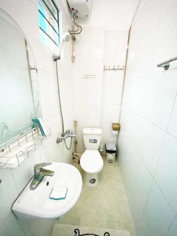 Koupelna v ubytování Mini Homestay