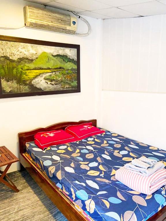 Postel nebo postele na pokoji v ubytování Mini Homestay