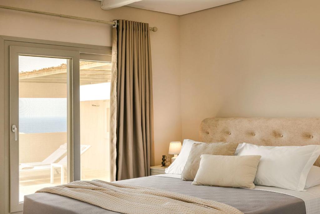 Postel nebo postele na pokoji v ubytování Zen Villas