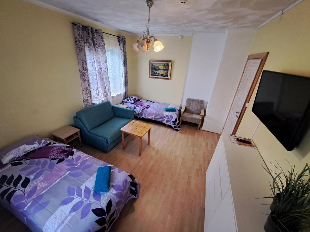 Postel nebo postele na pokoji v ubytování Paide B&B