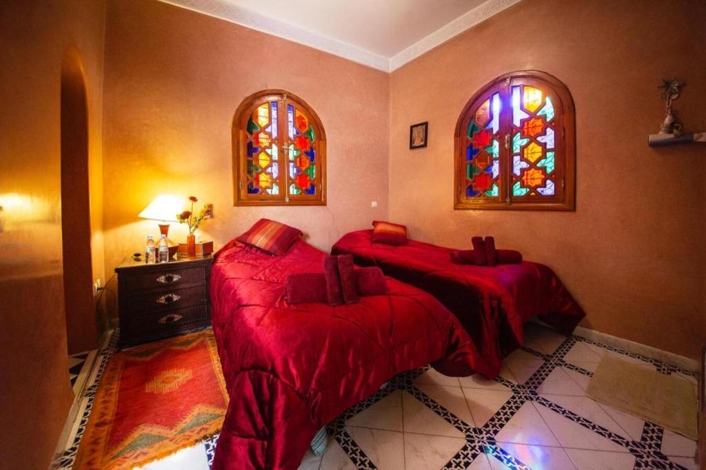 Postel nebo postele na pokoji v ubytování La lune de Marrakech Riad