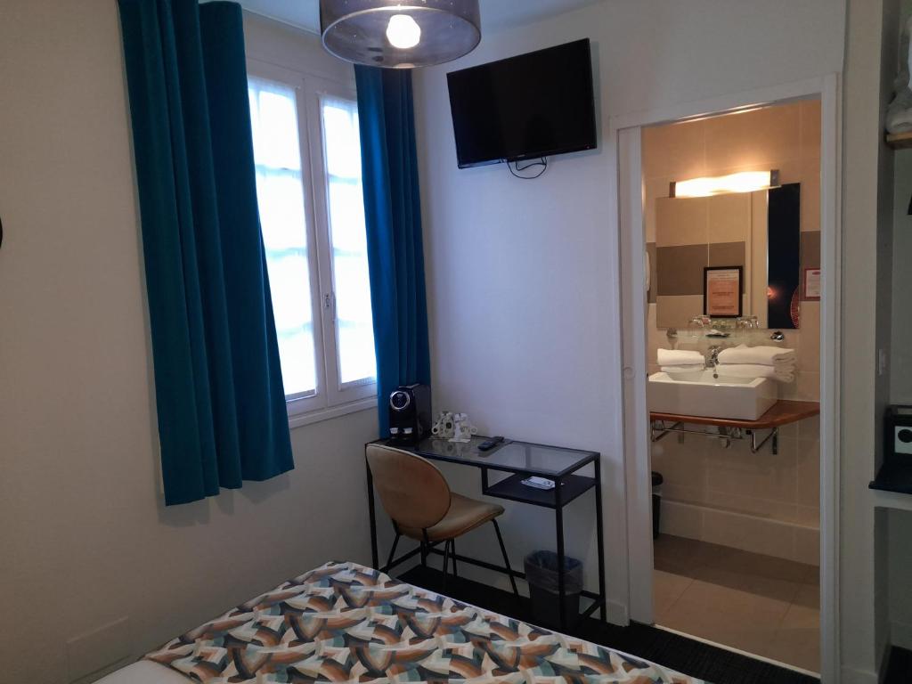 Postel nebo postele na pokoji v ubytování Hotel Reine Mathilde
