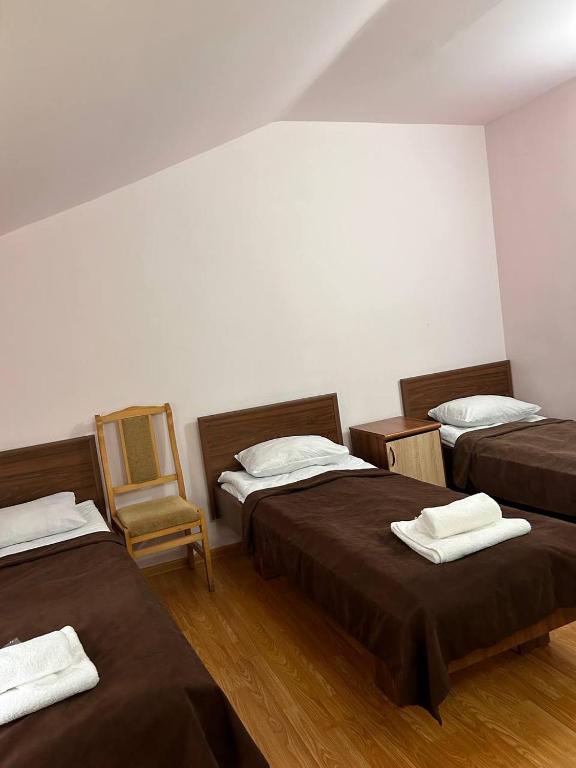 Postel nebo postele na pokoji v ubytování Nectar hotel