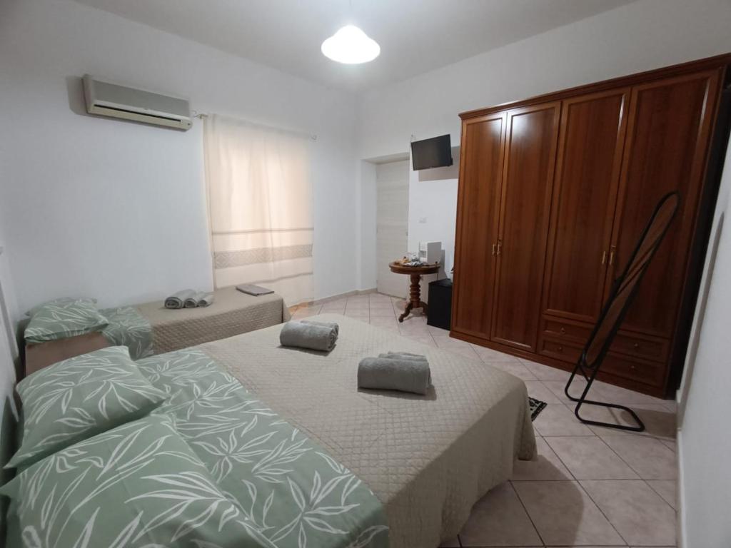Postel nebo postele na pokoji v ubytování Casa Iole