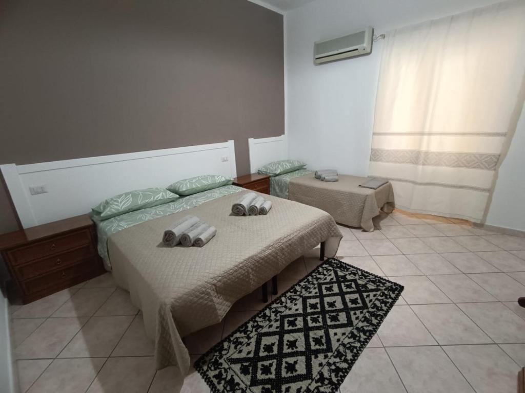 Postel nebo postele na pokoji v ubytování Casa Iole